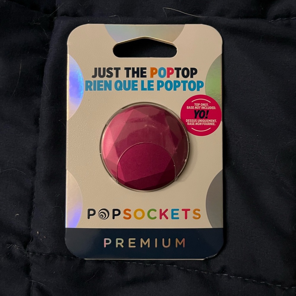 Swapable pop socket top